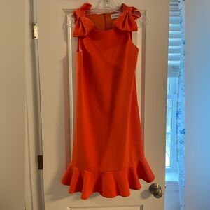 Elegant Orange Sleeveless Dress with Ruffle Hem and bows on the shoulders